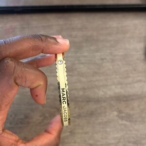 Marc Jacobs Gold-tone Scalloped Bangle with Logo Plate